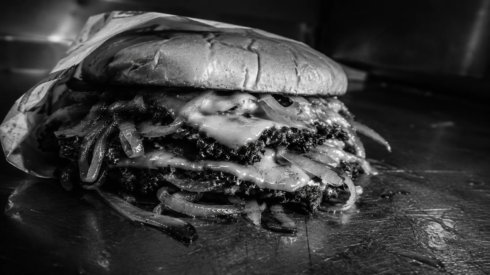 Oklahoma Onion Smash: double smash patties with thin translucent onions smashed into the beef and melted American cheese
